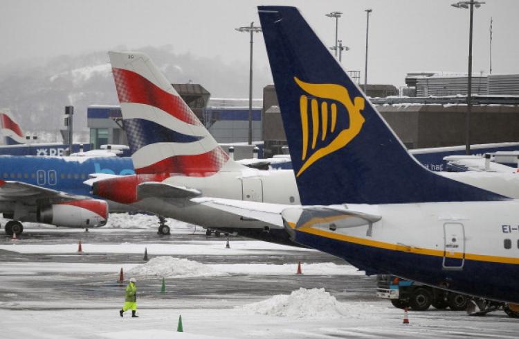 Planes are seen at a standstill in Edinburgh, Scotland. (Jeff J Mitchell/ Getty Images) Planes are seen at a standstill in Edinburgh, Scotland. (Jeff J Mitchell/ Getty Images)