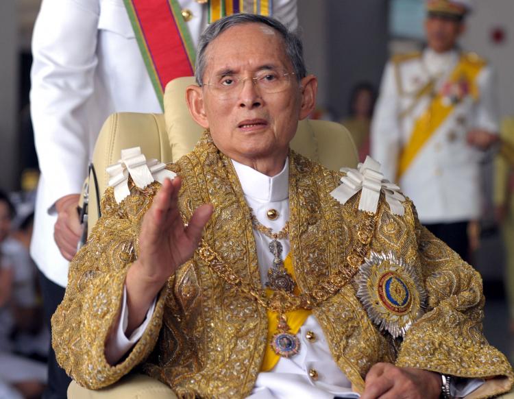 Thai King Bhumibol Adulyadej waves to well-wishers after the royal ceremony for his 83rd birthday in Bangkok on December 5, 2010. (Pornchai Kittiwongsakul/AFP/Getty Images) Thai King Bhumibol Adulyadej waves to well-wishers after the royal ceremony for his 83rd birthday in Bangkok on December 5, 2010. (Pornchai Kittiwongsakul/AFP/Getty Images)
