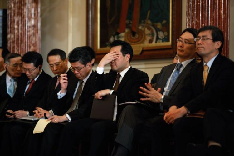 TALKS COMMENCE: Members of the South Korea delegation listen to a news conference after the Foreign Ministers of South Korea (Kim Sung-hwan), Japan (Seiji Maehara), and Secretary of State Hilary Clinton held a trilateral meeting. (Chip Somodevilla/Getty Images) TALKS COMMENCE: Members of the South Korea delegation listen to a news conference after the Foreign Ministers of South Korea (Kim Sung-hwan), Japan (Seiji Maehara), and Secretary of State Hilary Clinton held a trilateral meeting. (Chip Somodevilla/Getty Images)