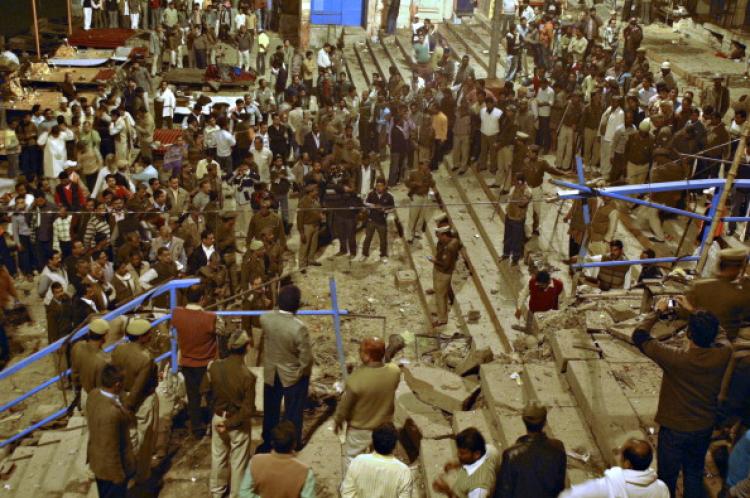 Security officials and onlookers gather at the site of a blast at a 'ghat' (bathing point) in Varanasi on Dec. 7, 2010. (STRDEL/AFP/Getty Images) Security officials and onlookers gather at the site of a blast at a 'ghat' (bathing point) in Varanasi on Dec. 7, 2010. (STRDEL/AFP/Getty Images)