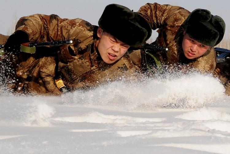 Chinese soldiers undergo a training session in Hami, northwest China's Xinjiang region on January 12, 2011. (STR/Getty Images) Chinese soldiers undergo a training session in Hami, northwest China's Xinjiang region on January 12, 2011. (STR/Getty Images)