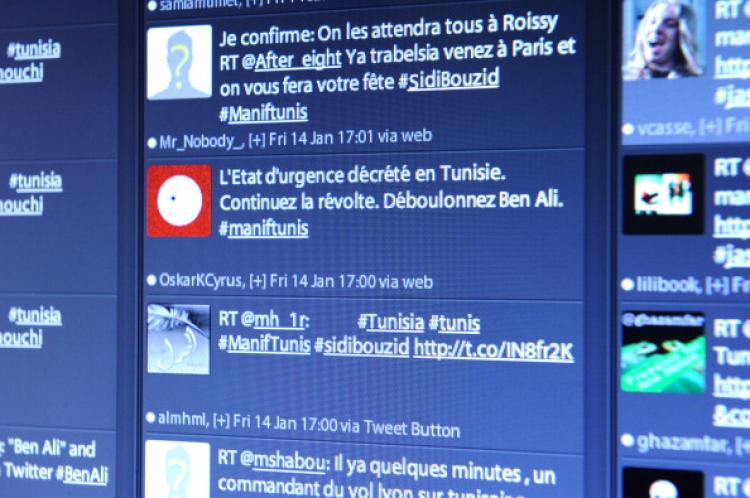 A picture taken on January 14, 2011 in Paris shows a computer screen showing tweets posted by people about the current situation in Tunisia. (Miguel Medina/AFP/Getty Images)