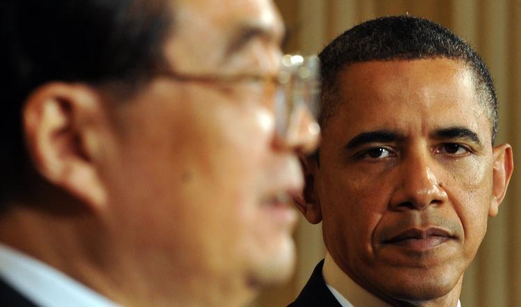 President Obama listens to Chinese leader Hu Jintao, as he answers a question about the human rights issue in China during a press conference in the East Room at the White House in Washington, DC, on January 19. (Jewel Samad/Getty Images) President Obama listens to Chinese leader Hu Jintao, as he answers a question about the human rights issue in China during a press conference in the East Room at the White House in Washington, DC, on January 19. (Jewel Samad/Getty Images)