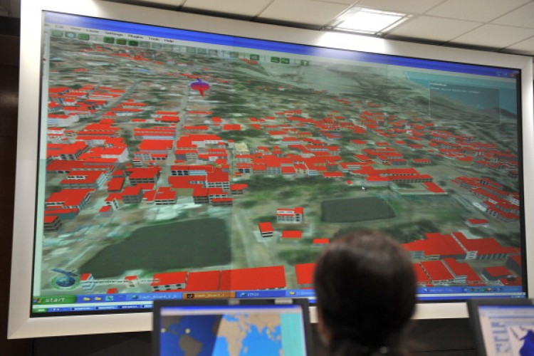 Indian Scientists work at the Tsunami Early Warning Centre of the Indian National Centre for Ocean Information Services (INCOIS) in Hyderabad on February 4, 2011.  (Noah Seelam/AFP/Getty Images)