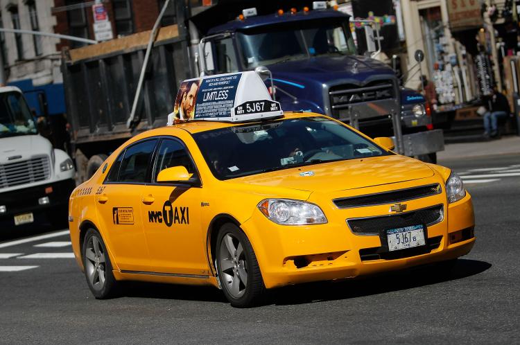 NEW YORK, NY - MARCH 01: A taxi cab drives on a street March 1, 2011 in New York City. (Chris Hondros/Getty Images) NEW YORK, NY - MARCH 01: A taxi cab drives on a street March 1, 2011 in New York City. (Chris Hondros/Getty Images)