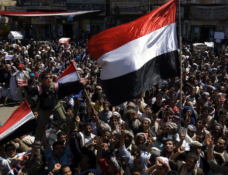 Yemenis protest against the regime of President Ali Abdullah Saleh in Sanaa on March 9, 2011, the morning after a Yemeni protester died of gunshot wounds after police opened fire overnight on anti-regime demonstrators in Sanaa. (Ahmad Gharabli/Getty Images ) Yemenis protest against the regime of President Ali Abdullah Saleh in Sanaa on March 9, 2011, the morning after a Yemeni protester died of gunshot wounds after police opened fire overnight on anti-regime demonstrators in Sanaa. (Ahmad Gharabli/Getty Images )
