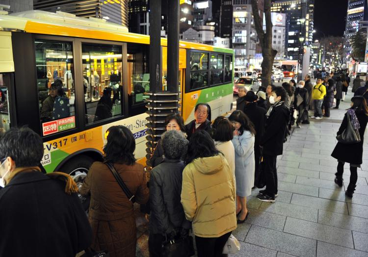 People make a long line to board buses in Tokyo as commuter trains stopped their services in the Tokyo metropolitan area on March 11, 2011. (Yoshikazu Tsuno/AFP/Getty Images) People make a long line to board buses in Tokyo as commuter trains stopped their services in the Tokyo metropolitan area on March 11, 2011. (Yoshikazu Tsuno/AFP/Getty Images)