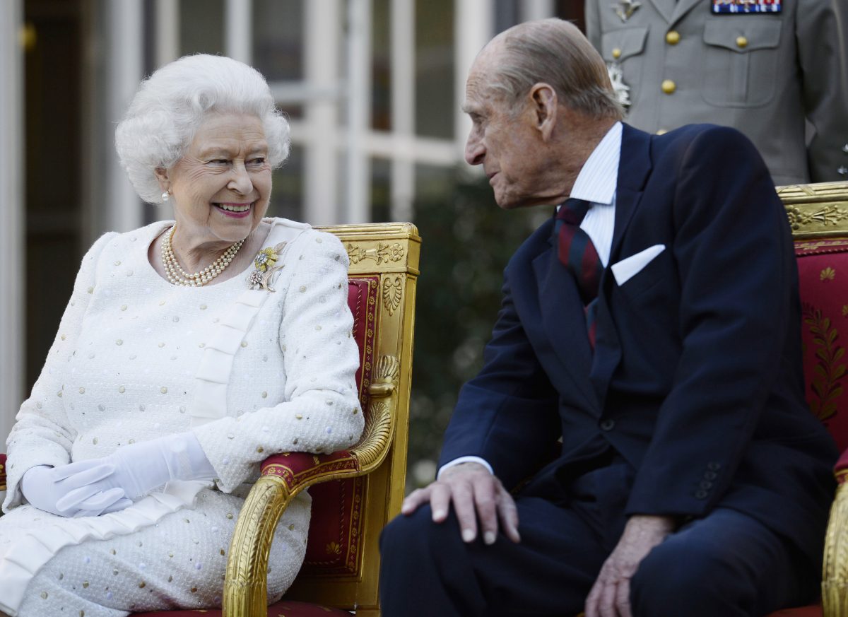 Queen Elizabeth II and Prince Philip, Duke of Edinburgh, attend a garden party in Paris, hosted by Sir Peter Ricketts, Britain's ambassador to France ahead of marking the 70th anniversary of the D-Day landings during World War II in Paris, France, on June 5, 2014. (Owen Humphreys/Getty Images)