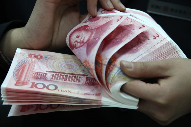 Many wealthy Chinese seek to emigrate or covet an international passport, recent surveys have found.(ChinaFotoPress/Getty Images) Many wealthy Chinese seek to emigrate or covet an international passport, recent surveys have found.(ChinaFotoPress/Getty Images)