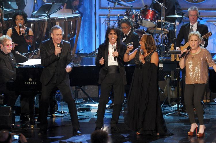 Sir Elton John, inductees Neil Diamond, Alice Cooper and Darlene Love and singer Bette Midler perform onstage at the 26th annual Rock and Roll Hall of Fame Induction Ceremony at The Waldorf=Astoria on March 14, 2011 in New York City. (Michael Loccisano/Getty Images) Sir Elton John, inductees Neil Diamond, Alice Cooper and Darlene Love and singer Bette Midler perform onstage at the 26th annual Rock and Roll Hall of Fame Induction Ceremony at The Waldorf=Astoria on March 14, 2011 in New York City. (Michael Loccisano/Getty Images)