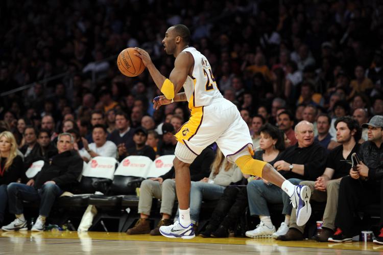 Kobe Bryant #24 of the Los Angeles Lakers takes the ball down court. The LA Lakers beat the Suns 111-103, on Tuesday night's game at Staples Center in Los Angeles, Ca. (Harry How/Getty Images) Kobe Bryant #24 of the Los Angeles Lakers takes the ball down court. The LA Lakers beat the Suns 111-103, on Tuesday night's game at Staples Center in Los Angeles, Ca. (Harry How/Getty Images)