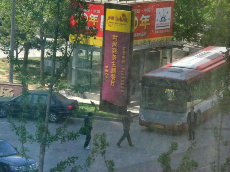 Police cars and bus are parked near Shouwang Church worship site in Beijing, ready to take church members away, April 24. (Photo provided by an anonymous insider) Police cars and bus are parked near Shouwang Church worship site in Beijing, ready to take church members away, April 24. (Photo provided by an anonymous insider)