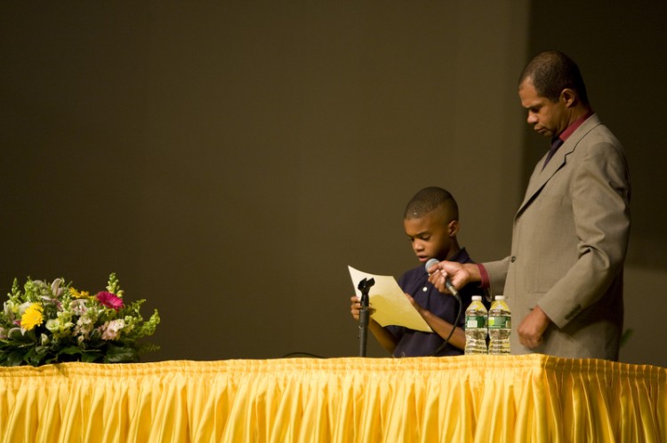Zachary, an 8-year-old boy, was the youngest speaker. 'I need to become more tolerant,' he said. (Dai Bing/The Epoch Times)