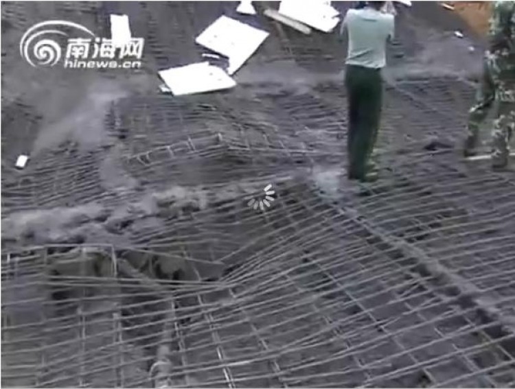 Warped rebar is exposed after China's most recent bridge collapse in Wanning, Hainan Province, Aug. 8, 2011. (Screenshot from hinews.cn)