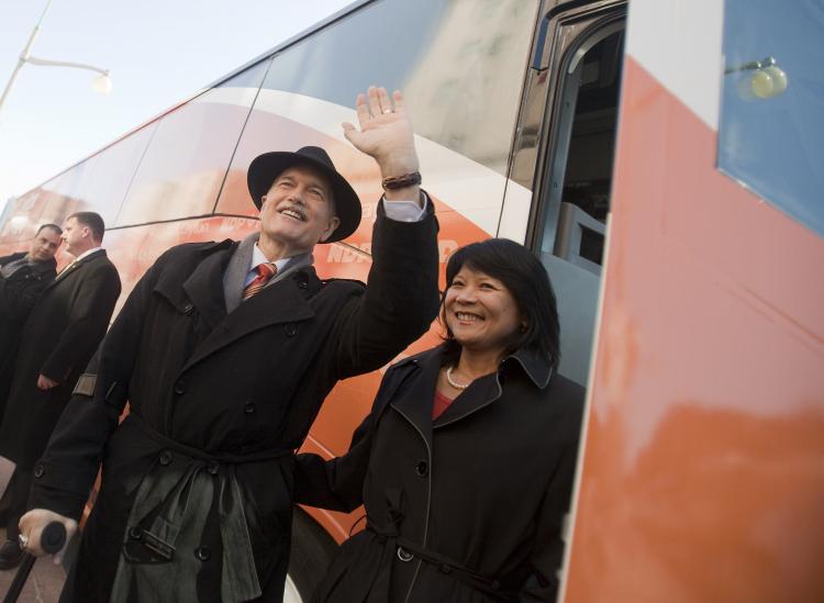 New Democratic Party leader Jack Layton waves to the crowd as he boards the bus with his wife, NDP Member of Parliament Olivia Chow, following the NDP's campaign kickoff event at the Chateau Laurier in Ottawa on March 26. (Geoff Robins/AFP/Getty Images) New Democratic Party leader Jack Layton waves to the crowd as he boards the bus with his wife, NDP Member of Parliament Olivia Chow, following the NDP's campaign kickoff event at the Chateau Laurier in Ottawa on March 26. (Geoff Robins/AFP/Getty Images)