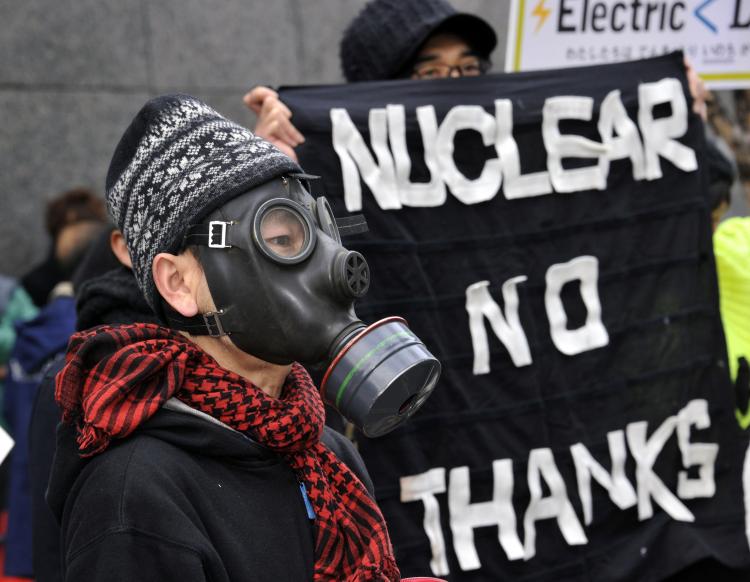 A protester wears a gas mask to protest against nuclear plants in front of the Tokyo Electric Power Co. headquarters in Tokyo on March 27. In light of the nuclear crisis continues in Japan, Physicians for Global Survival are calling for a moratorium on new nuclear reactors in Canada and a suspension of operations at existing reactors on fault lines. (Yoshikazu Tsuno/AFP/Getty Images) A protester wears a gas mask to protest against nuclear plants in front of the Tokyo Electric Power Co. headquarters in Tokyo on March 27. In light of the nuclear crisis continues in Japan, Physicians for Global Survival are calling for a moratorium on new nuclear reactors in Canada and a suspension of operations at existing reactors on fault lines. (Yoshikazu Tsuno/AFP/Getty Images)