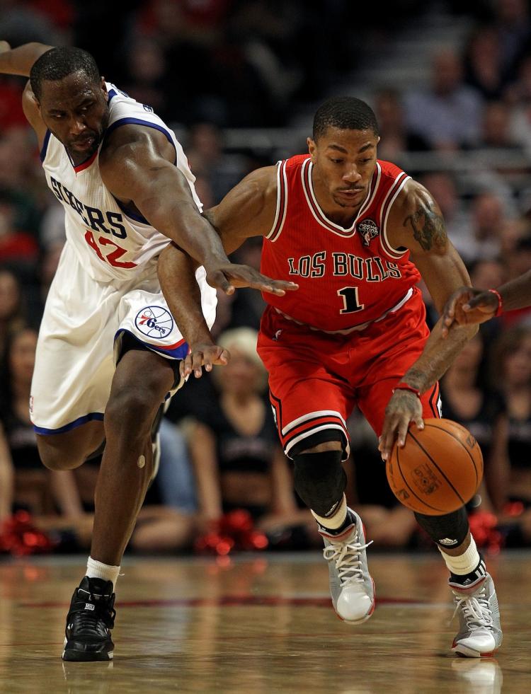 Derrick Rose #1 of the Chicago Bulls and Elton Brand #42 of the Philadelphia 76ers chase down a loose ball at the United Center on March 28, 2011 in Chicago, Illinois. (Jonathan Daniel/Getty Images) Derrick Rose #1 of the Chicago Bulls and Elton Brand #42 of the Philadelphia 76ers chase down a loose ball at the United Center on March 28, 2011 in Chicago, Illinois. (Jonathan Daniel/Getty Images)