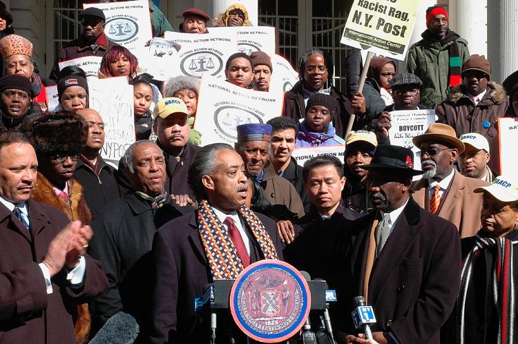 CONTENTIOUS CARTOON: The Rev. Al Sharpton speaks on the steps of City Hall at a press conference on Tuesday calling for the NY Post and news mogul Rupert Murdoch to take action after printing a racially charged political cartoon.  (Jonathan Weeks/The Epoch Times)