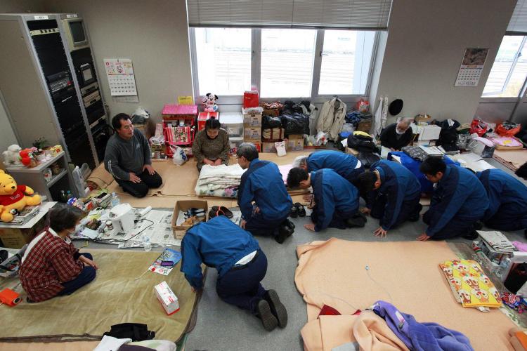 Tokyo Electric Power Co. President Masataka Shimizu (C) and company executives bow to evacuees to apologize for the accident at their company's Fukushima Daiichi nuclear power plant at a shelter at Koriyama in Fukushima prefecture on April 22. (STR/AFP/Getty Images) Tokyo Electric Power Co. President Masataka Shimizu (C) and company executives bow to evacuees to apologize for the accident at their company's Fukushima Daiichi nuclear power plant at a shelter at Koriyama in Fukushima prefecture on April 22. (STR/AFP/Getty Images)