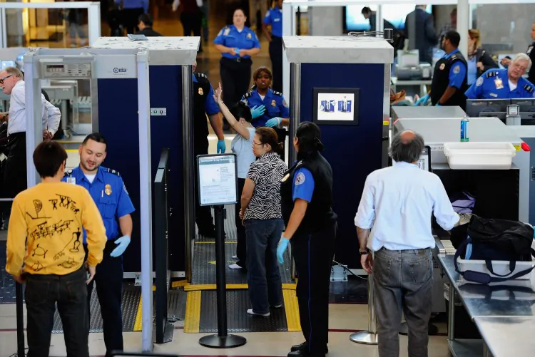 Transportation Security Administration agents screen passengers at Los Angeles International Airport. (Kevork Djansezian/Getty Images)