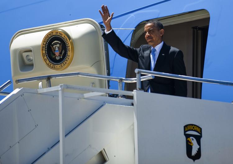 President Obama waves as he walks off Air Force One at Fort Campbell, Kentucky, May 6. On Wednesday due to bad weather, Air Force One made an aborted landing attempt with Obama aboard at the Bradley International Airport in Connecticut. (Jim Watson/Getty Images ) President Obama waves as he walks off Air Force One at Fort Campbell, Kentucky, May 6. On Wednesday due to bad weather, Air Force One made an aborted landing attempt with Obama aboard at the Bradley International Airport in Connecticut. (Jim Watson/Getty Images )