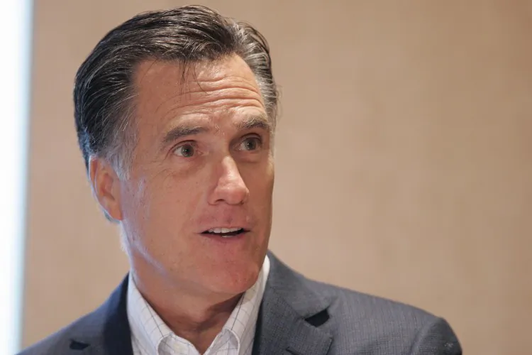 Former Massachusetts Gov. Mitt Romney delivers his address on health care reform on May 12 at the University of Michigan in Ann Arbor, Mich. Romney is in the lead in the latest Gallup Poll of Republican White House hopefuls. (J.D. Pooley/Getty Images)