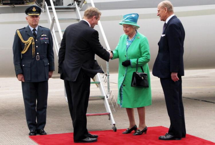 Queen Elizabeth shakes hands with Irish Prime Minister Enda Kenny (2nd L) as she and Prince Philip, the Duke of Edinburgh, (R) prepare to board the royal jet at Cork airport, Ireland, on May 20, 2011. (Maxwells - Irish Government/AFP/Getty Images) Queen Elizabeth shakes hands with Irish Prime Minister Enda Kenny (2nd L) as she and Prince Philip, the Duke of Edinburgh, (R) prepare to board the royal jet at Cork airport, Ireland, on May 20, 2011. (Maxwells - Irish Government/AFP/Getty Images)