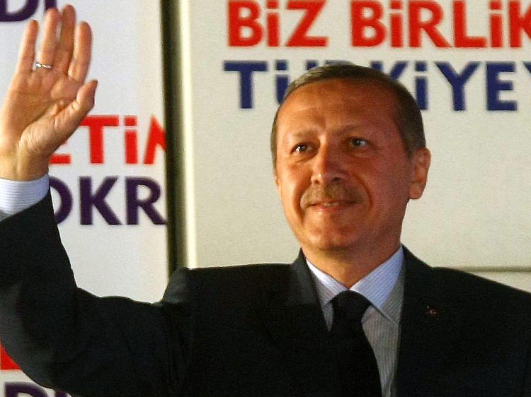SWEET VICTORY: Turkish Prime Minister Recep Tayyip Erdogan's Islamist-rooted Justice and Development Party (AKP) won a crushing majority in the parliamentary election for a third straight win, with nearly 50 percent of the vote. (Adem Altan/AFP/Getty Images) SWEET VICTORY: Turkish Prime Minister Recep Tayyip Erdogan's Islamist-rooted Justice and Development Party (AKP) won a crushing majority in the parliamentary election for a third straight win, with nearly 50 percent of the vote. (Adem Altan/AFP/Getty Images)
