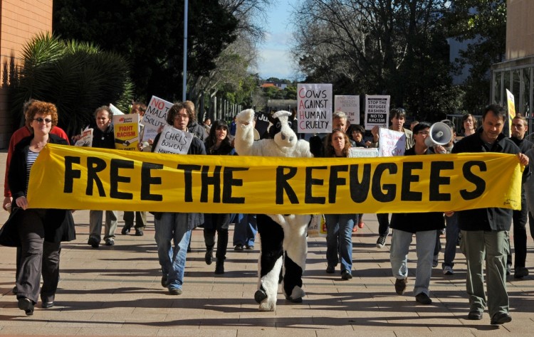 Protesters march towards a theatre where Immigration Minister Chris Bowen was delivering a speech on the government's refugee program at the University of NSW, in Sydney, on June 17, 2011. (Torsten Blackwood/AFP/Getty Images) Protesters march towards a theatre where Immigration Minister Chris Bowen was delivering a speech on the government's refugee program at the University of NSW, in Sydney, on June 17, 2011. (Torsten Blackwood/AFP/Getty Images)