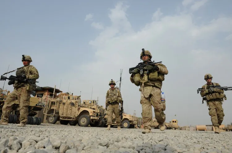 U.S. soldiers from Viper Company (Bravo) 1-26 Infantry head for a foot patrol at Combat Outpost (COP) Sabari in Khost province, east of Afghanistan on June 26, 2011. (Ted Alijibe/AFP/Getty Images)
