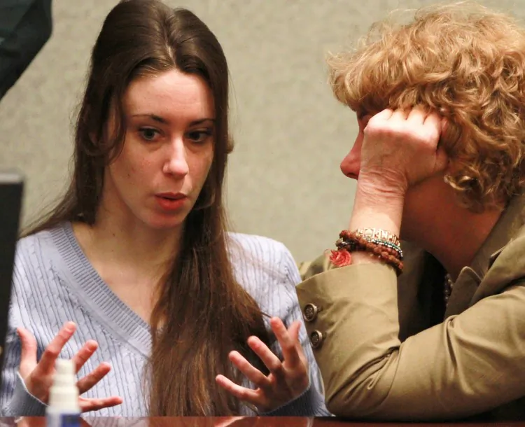 Casey Anthony (L) speaks with her attorney, Dorothy Clay Sims, at her sentencing hearing on lying to a law enforcement officer at Orange County Courthouse in Orlando, Fla., on July 7 2018. (Joe Burbank-Pool/Getty Images)