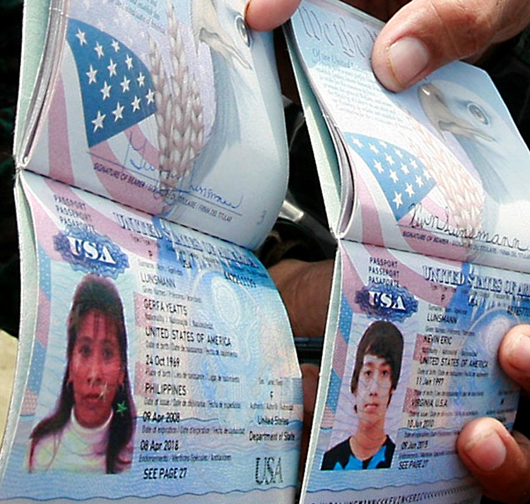 Police show passports of Gerfa Yeatts Lunsmann and her son, Kevin. (STR/AFP/Getty Images) Police show passports of Gerfa Yeatts Lunsmann and her son, Kevin. (STR/AFP/Getty Images)