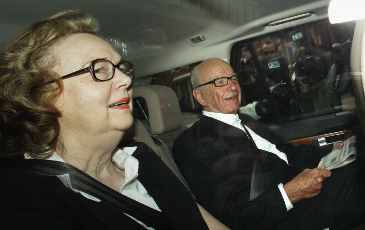 Rupert Murdoch, the chief executive officer of News Corp., is driven from his apartment on July 13, 2011 in London, England. The three main UK political parties are expected to support a motion urging Murdoch's News Corp. to drop its bid to buy broadcaster BSkyB whilst an investigation into phone hacking at the News of the World takes place. (Oli Scarff/Getty Images ) Rupert Murdoch, the chief executive officer of News Corp., is driven from his apartment on July 13, 2011 in London, England. The three main UK political parties are expected to support a motion urging Murdoch's News Corp. to drop its bid to buy broadcaster BSkyB whilst an investigation into phone hacking at the News of the World takes place. (Oli Scarff/Getty Images )