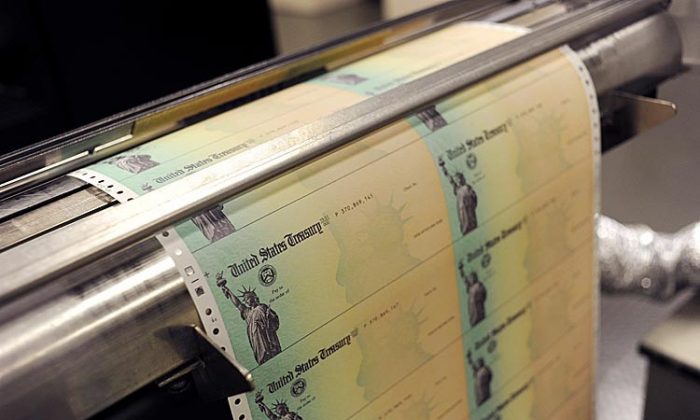 Blank U.S. Treasury checks run through a printer at the U.S. Treasury facility in Philadelphia, Pa. (William Thomas Cain/Getty Images)