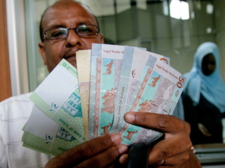 Freshly-minted notes of the new Sudanese pound in Khartoum, on July 24, 2011 as the country issues new currency following the South's secession from the north.  (Ashraf Shazly/AFP/Getty Images)