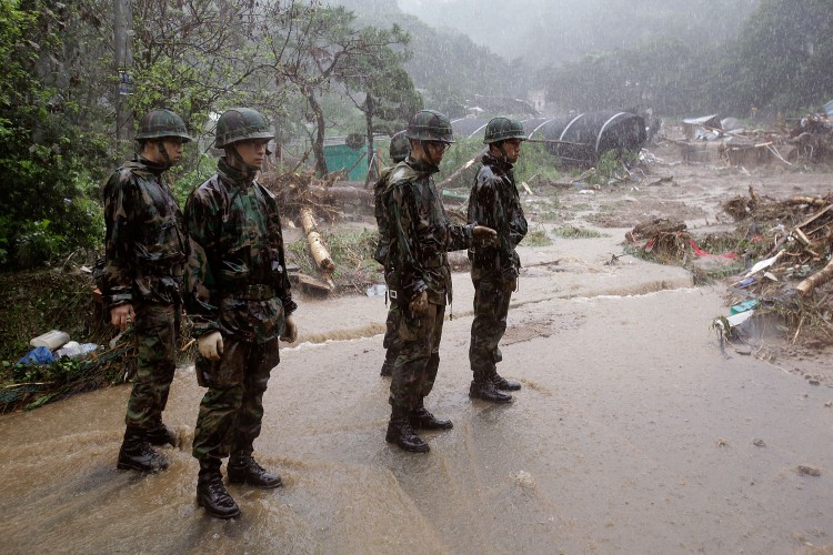 South Korea Assailed by Floods, Landslides (Photos)