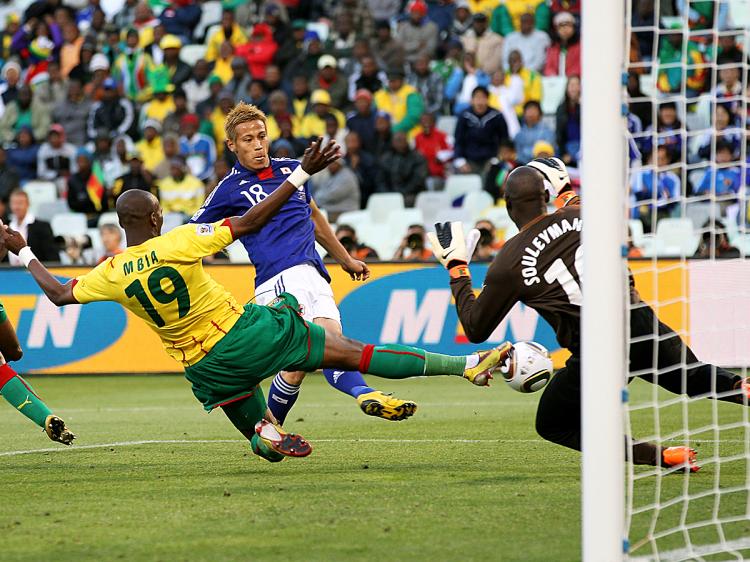 WINNING GOAL: Japan midfielder Keisuke Honda (in blue) scores during the Group E first round 2010 World Cup match against Cameroon. Ian Walton/AFP/Getty Images WINNING GOAL: Japan midfielder Keisuke Honda (in blue) scores during the Group E first round 2010 World Cup match against Cameroon. Ian Walton/AFP/Getty Images