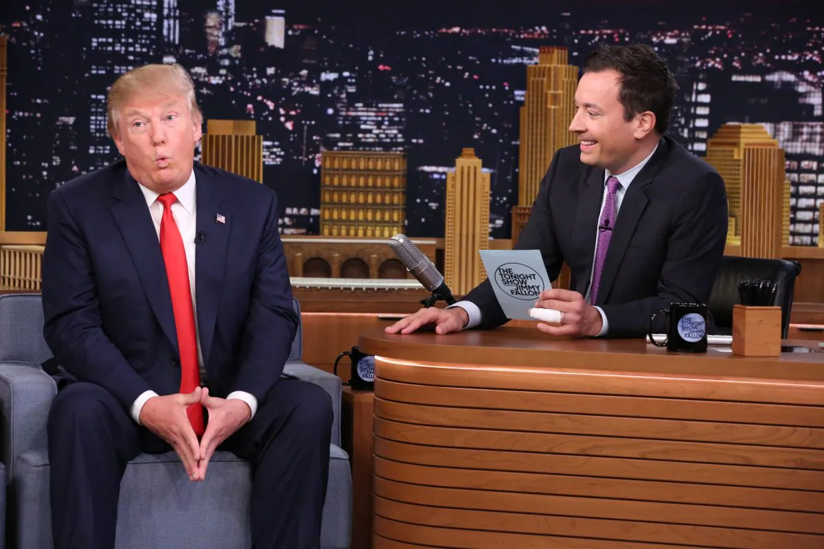 In this image released by NBC, Republican presidential candidate Donald Trump, left, appears with host Jimmy Fallon during a taping of "The Tonight Show Starring Jimmy Fallon," on Friday, Sept. 11, 2015, in New York. (Douglas Gorenstein/NBC via AP)