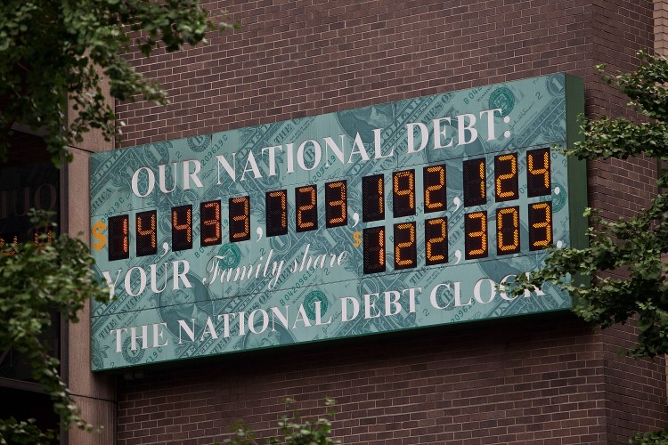 The National Debt Clock, a billboard-size digital display showing the increasing US debt The National Debt Clock, a billboard-size digital display showing the increasing US debt