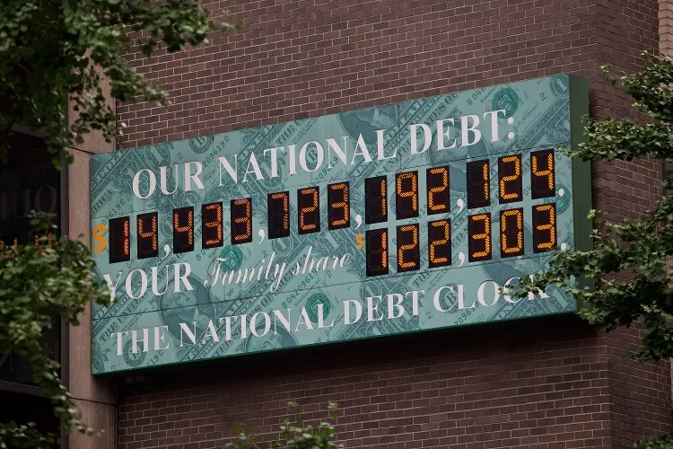 The National Debt Clock, a billboard-size digital display showing the increasing U.S. debt, is seen on the corner of Sixth Avenue and West 44th Street, in New York City, on Aug. 1, 2011. (Andrew Burton/Getty Images)