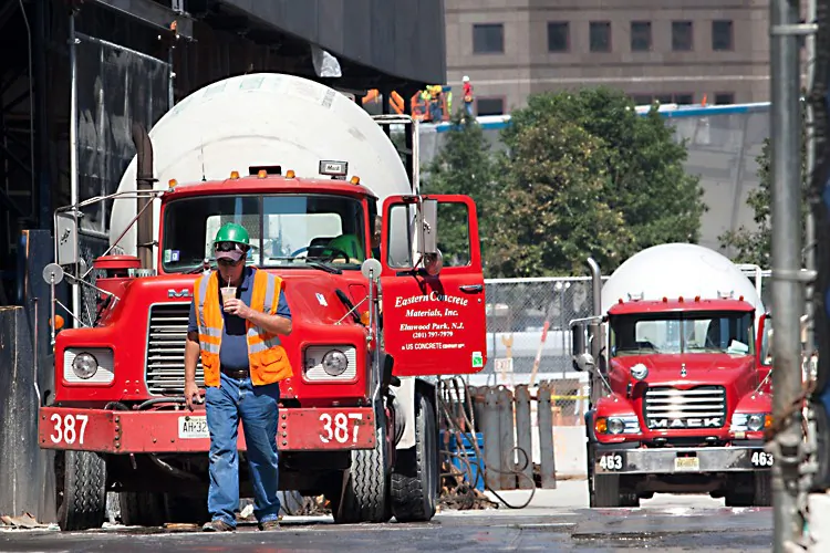 Concrete trucks sit inside the World Trade Center construction area in New York on Aug. 2, 2011. Construction on the 800,000-square-foot transit hub at the World Trade Center reportedly stopped when concrete workers from local unions went on strike Aug. 1, in protest of a contract that expired on June 30. (Andrew Burton/Getty Images)