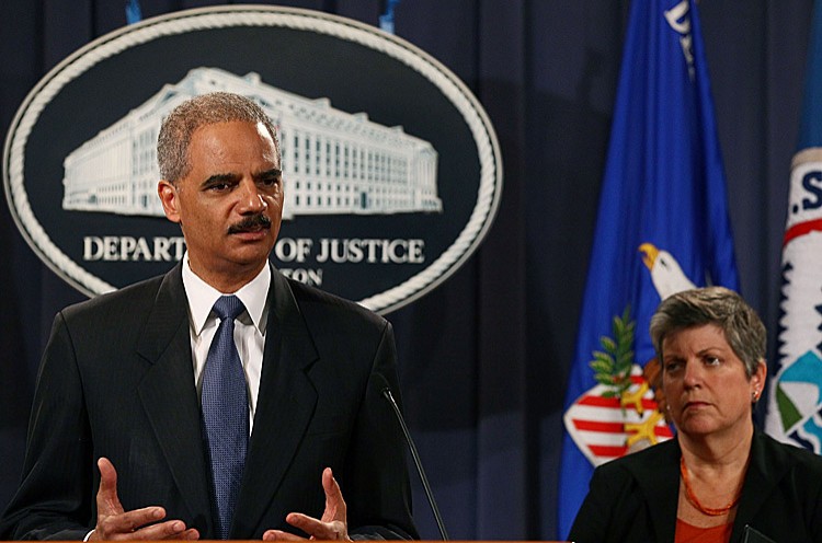 Attorney General Eric Holder (L) speaks while Secretary of Homeland Security Janet Napolitano looks on during a news conference at the Justice Department on August 3, in Washington. (Mark Wilson/Getty Images) Attorney General Eric Holder (L) speaks while Secretary of Homeland Security Janet Napolitano looks on during a news conference at the Justice Department on August 3, in Washington. (Mark Wilson/Getty Images)