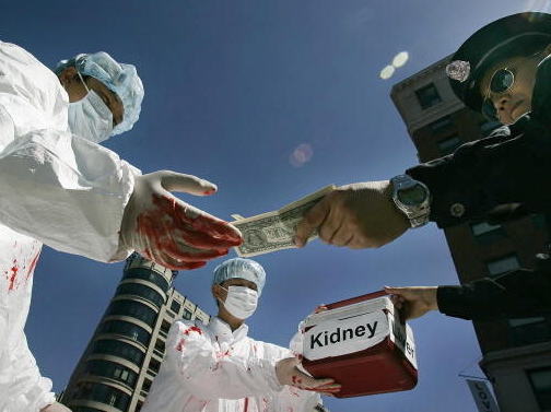 1207240706412133_organ_dramatization Falun Gong demonstrators dramatize an illegal act of paying for human organs