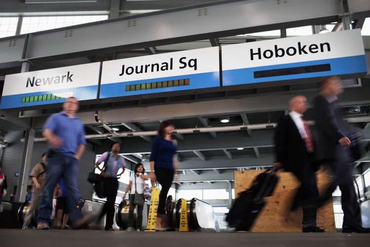 Commuters exit a PATH train station at the World Trade Center site on August 16, in New York City. The Governer as recommended a new Executive Director for the Port Authority of New York and New Jersey. (Spencer Platt/Getty Images)