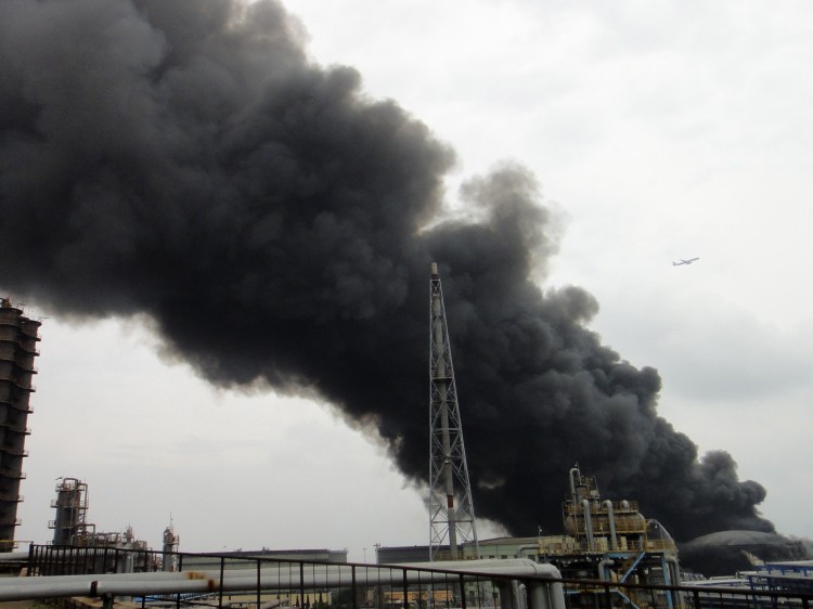 Smoke billows from a fire at Chinese state-owned oil giant PetroChina's largest oil refinery in Dalian, in China's northeastern Liaoning Province, on Aug. 29, 2011. (AFP/Getty Images) Smoke billows from a fire at Chinese state-owned oil giant PetroChina's largest oil refinery in Dalian, in China's northeastern Liaoning Province, on Aug. 29, 2011. (AFP/Getty Images)