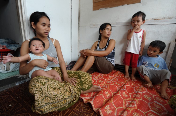 Former refugees and their children from Myanmar who had settled in Malaysia chat in their house in Kuala Lumpur on August 31, 2011. (Mohd Rasfan/AFP/Getty Images) Former refugees and their children from Myanmar who had settled in Malaysia chat in their house in Kuala Lumpur on August 31, 2011. (Mohd Rasfan/AFP/Getty Images)