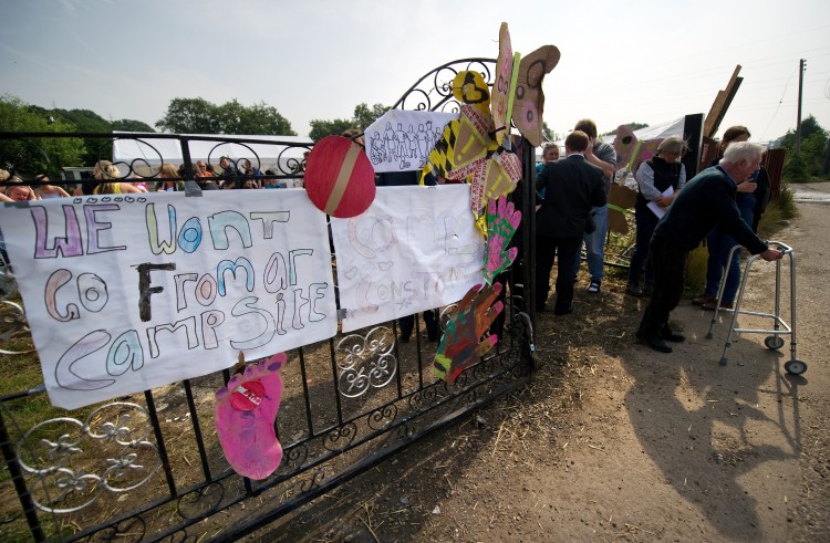 Residents of the Dale Farm Travelers' site near Basildon in Essex, England leave the communal area, after addressing the media at a press conference, on Sept. 2, 2011. (Leon Neal/AFP/Getty Images) Residents of the Dale Farm Travelers' site near Basildon in Essex, England leave the communal area, after addressing the media at a press conference, on Sept. 2, 2011. (Leon Neal/AFP/Getty Images)