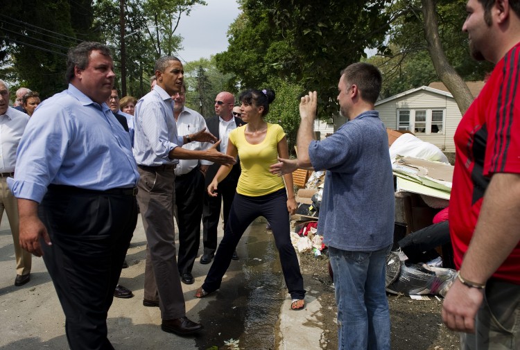 US President Barack Obama (2nd L) shakes hands with residents as he tours through the devastation left by Hurricane Irene with New Jersey Governor Chris Christie (L) in Wayne, New Jersey, September 4, 2011. (Jim Watson/AFP/Getty Images) US President Barack Obama (2nd L) shakes hands with residents as he tours through the devastation left by Hurricane Irene with New Jersey Governor Chris Christie (L) in Wayne, New Jersey, September 4, 2011. (Jim Watson/AFP/Getty Images)