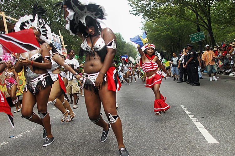 Revelers dance during the West Indian-American Day Parade September 5, in the Brooklyn borough of New York City. (Mario Tama/Getty Images) Revelers dance during the West Indian-American Day Parade September 5, in the Brooklyn borough of New York City. (Mario Tama/Getty Images)