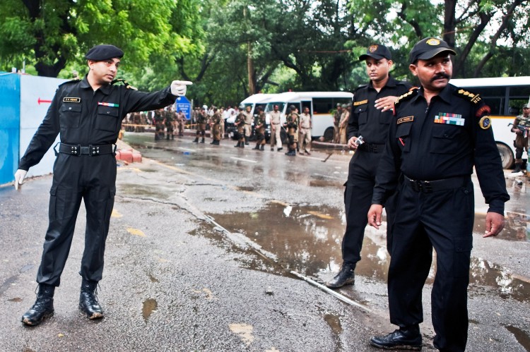 Indian National Security Guard commandos inspect the scene of a bomb blast outside Delhi's High Court on September 7, 2011 in Delhi, India. (Ravi Mishra/Getty Images) Indian National Security Guard commandos inspect the scene of a bomb blast outside Delhi's High Court on September 7, 2011 in Delhi, India. (Ravi Mishra/Getty Images)